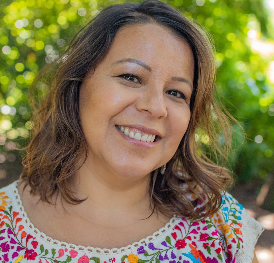 Light Owl Shop owner Maria Muñoz .