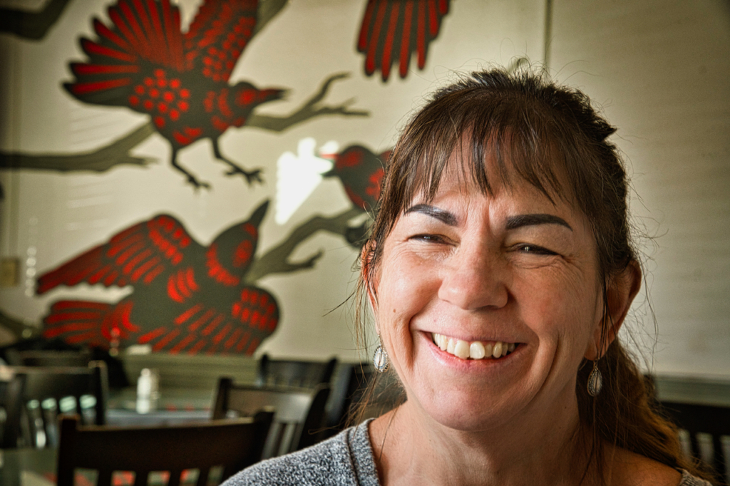 Nacho Mama's Fry Bread Cafe owner Debra LeComb smiling for the camera 