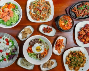 Seoul Tofu & Jjim spread of Korean dishes photo credit Uber Eats