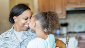 Veteran Mother and daughter being affectionate